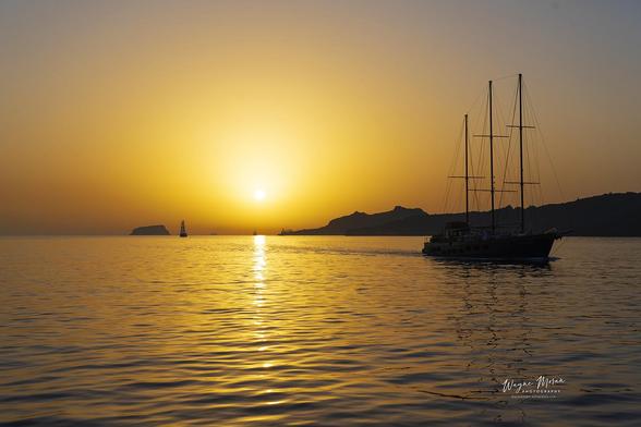 Sunset Sailboat Cruise Santorini Greece

Standing at the top of the caldera in Santorini, Greece offers breathtaking panoramic views that are truly awe-inspiring. From this vantage point, you're treated to a stunning vista that encompasses the deep blue waters of the Aegean Sea contrasting against the dramatic cliffs and whitewashed buildings of the island.

The caldera itself is a massive crater formed by a volcanic eruption thousands of years ago, and it provides a unique geological setting for witnessing the beauty of Santorini. As you look out from the edge, you can see the iconic towns perched precariously on the cliffs, including Fira, Oia, and Imerovigli. The whitewashed buildings with their blue domes and colorful accents add a picturesque charm to the landscape.

During sunrise or sunset, the views become even more enchanting as the sky is painted with hues of pink, orange, and purple, casting a magical glow over the entire scene. The sun sinking below the horizon or rising over the vast expanse of the sea creates a mesmerizing spectacle that's unparalleled anywhere else in the world.
mpression and create memories that will stay with you forever.


https://fineartamerica.com/featured/sunset-sailboat-cruise-santorini-greece-wayne-moran.html

#Santorini #Greece #Sunset #GreekIsles #GreekIslands #Mediteranean #FineArt #landscape #photography #travel #travelphotography

#AYearForArt #buyintoArt #fineart #art