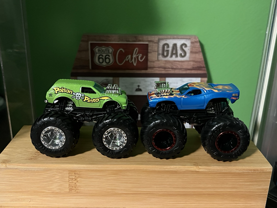 A two pack of 4x4 car toys made by HotWheels. The Poison Pinto and Rodger Dodger.