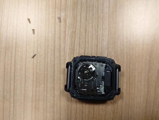 Casio watch with rear open and new CR1620 battery installed,