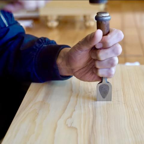 Hand cut tree trunks are cured and carved into Go boards in Japan.