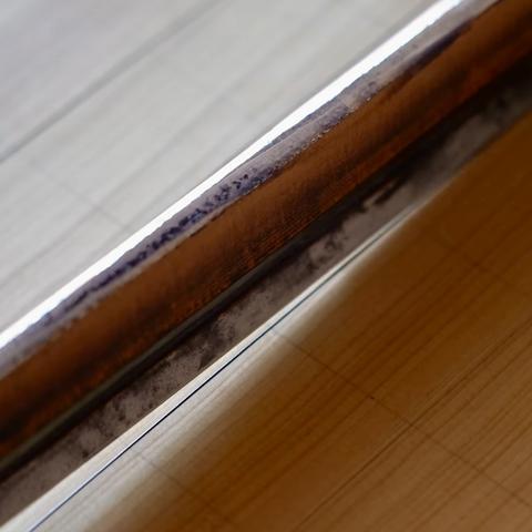 Here handmade ink is added line by line to make Go boards in Japan.