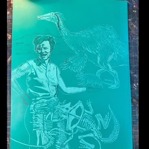 My full green vinyl Lino block with carving in progress. A woman in slacks and sleeveless button down with collar is turned in a 3/4 view with her left side arm extended and right side arm bent and resting on the small of her back. She has short hair and appears brightly lit from one side. In front of her are the Fighting Dinosaurs fossils: a protoceratops and velociraptor entwined. Above her as-of-yet-uncarved hand is a rodent and behind that is a deinocheirus dinosaur.