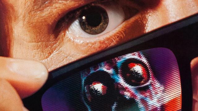 Closeup of eye and sunglasses for the movie "They Live."