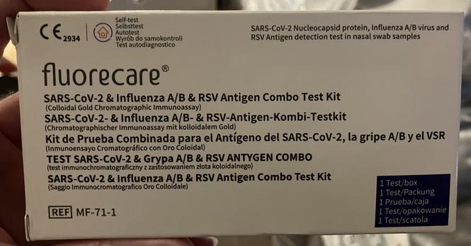 A box of a Covid, influenza a and B, and RSV antigen test