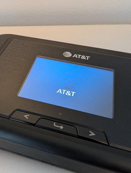 An AT&T-sold Franklin Wireless A50 hotspot showing the carrier's logo on its bootup screen.