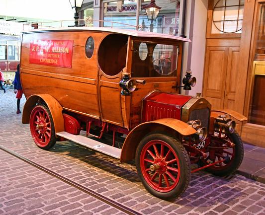 Wooden Delivery Truck once used by the Allison Butcher shop on display in the Riverside Museum in Glasgow
