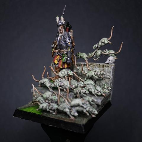 Luthor Wolfenbaum, narrator of the Mordheim Rulebook defending a find of Wyrdstone from what he will later describe as a Skaven horde (it’s lots of sewer rats), he’s dressed in Marienburger Livery of red, yellow, and blue. As all of these are another FediPaint entry.