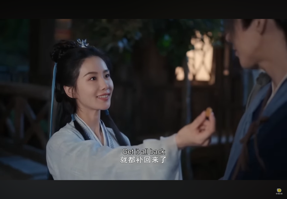 Ren Ruyi offers Ning Yuanzhou a caramel.