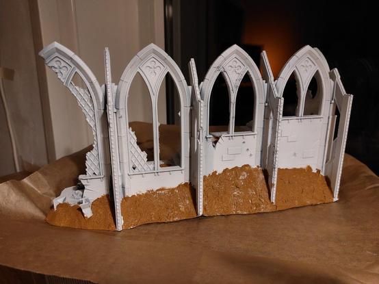 Partial Cathedral ruin primed white and with debris slopes covered in mud texture