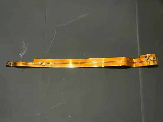 raw flex cable of an ipod classic battery, separated from the battery and the bms board.