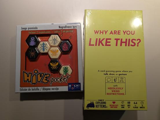 Boxes of board games Hive Pocket Edition and Why Are you like this