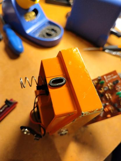 Photo of a Boss DS-1 guitar pedal with a new rubber grommet.