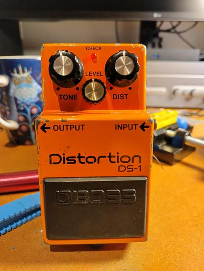 Photo of a Boss DS-1 guitar pedal with new Tone and Distortion knobs.