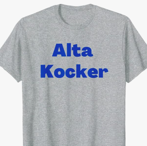 The funny Yiddish saying Alta Kocker is shown in blue lettering on a T shirt.