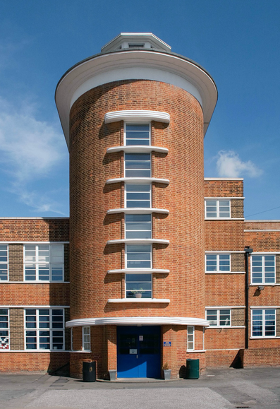 A colour photograph of the streamlined entrance staircase tower of Lady Bankes school