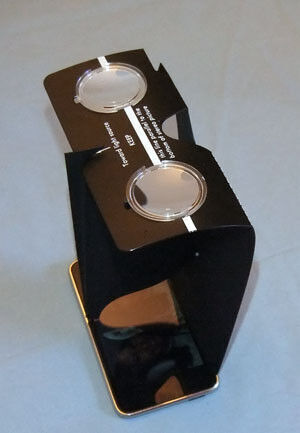 Stereopticon 707 stereoscope, sitting on a smart phone.