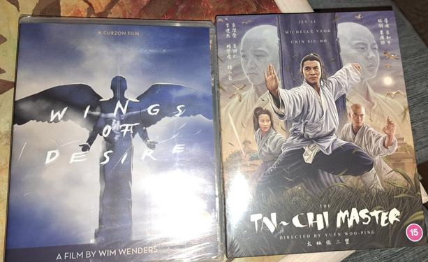 Two blu ray movies. 

Left "wings of desire" starring Bruno Ganz

Right "Tai-Chi Master" starring pre Hollywood Jet Li and Michelle Yeoh.