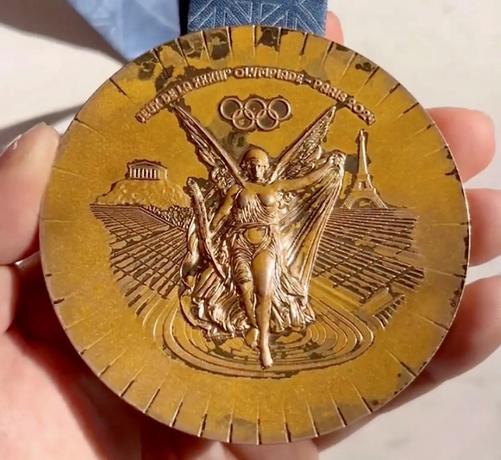 A participation medal at the French Olympics in 2024 crumbling after minimal handling.

“The mint discovered that the varnish used to prevent oxidation was defective,” the report reads. “Its varnish recipe is a trade secret, but the coating was weakened after the mint changed it to conform to recent European Union regulations banning the use of chromium trioxide, a toxic chemical used to prevent metal from rusting, according to La Lettre, a French industry newspaper.”

source https://www.theage.com.au/sport/and-the-gold-for-the-worst-olympic-medals-goes-to-paris-20250121-p5l64v.html