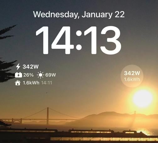 iOS lock screen widgets showing battery, energy production and current power from a solar system