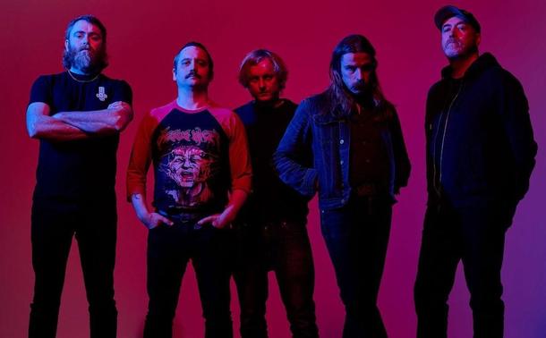 <img alt="Pigs Pigs Pigs Pigs Pigs Pigs Pigs announce new album &apos;Death Hilarious&apos;" src="https://theneedledrop.com/content/images/2025/01/pigsx7.jpeg" /><p>Stoner metal heavyweight <strong>Pigs Pigs Pigs Pigs Pigs Pigs Pigs </strong>return, following their 2023 fuzzed-up behemoth <em>Land of Sleeper. </em>The Newcastle band&apos;s newest record <em>Death Hilarious </em>will be released April 4 via Missing Piece Records (North America) and Rocket Records (everywhere else). </p><div class="kg-card kg-button-card kg-align-center"><a class="kg-btn kg-btn-accent" href="https://viagogo.prf.hn/click/camref:1011l3PmoK/pubref:tnd/[p_id:1011l562158]/destination:https://www.viagogo.com/Concert-Tickets/Rock-and-Pop/Pigs-Pigs-Pigs-Pigs-Pigs-Pigs-Pigs-Tickets?ref=theneedledrop.com">See Pigs x7 Live</a></div><p>Along with <em>Death Hilarious</em>&apos;s announcement, Pigs also share their new single &quot;Stitches&quot; and its accompanying stop-motion nightmare of a music video. Directed by Ben Faircloth, the clip has the band dismembered and sewn onto new grotesque creations, soundtracked by Pigs&apos; fitting Sabbathian scuzz. </p><p>Watch the music video for &quot;Stitches&quot; here:</p><figure class="kg-card kg-embed-card"></figure><p>Frontman Matt Baty describes the song as &quot;an expression of vulnerability, paradoxical emotions, and those so familiar pangs of anxiety I wrestle with while butting heads with societal expectations and personal struggles.&quot;<br /><br />Pi