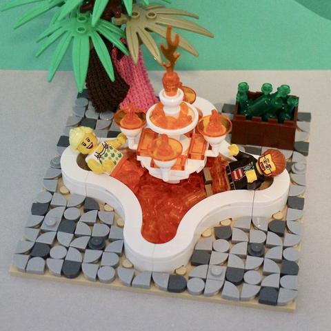 2 lego minifigures in the rum fountain of youth