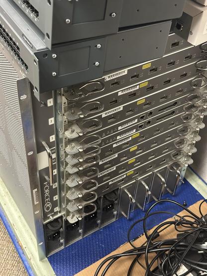 A very large Force 10 network switch, with 8 outfitted line cards, 4 PSUs, and 4 PSU blanks.