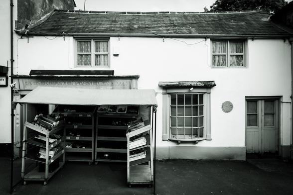 An old cottage and convenience store.