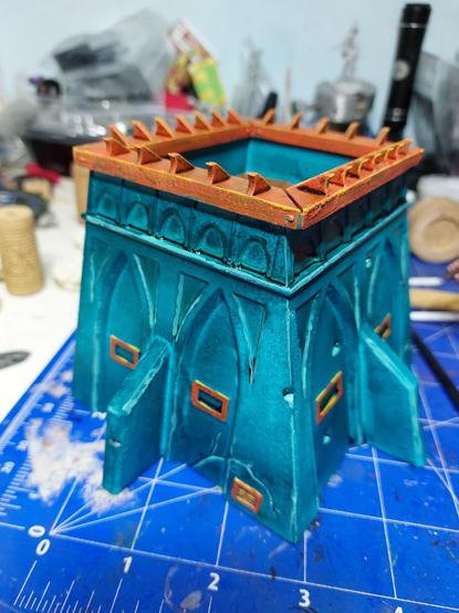 Small gothic sci-fi or religious idiot bunker with the colours orange and turquoise which makes it look like it's some lizardmen thing apparently. Strong highlights with yellow and verdigris.