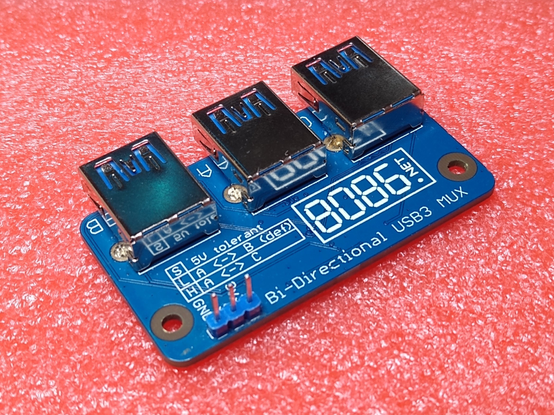 Rectangular PCB with 3 USB-3 Type-A sockets along one edge.