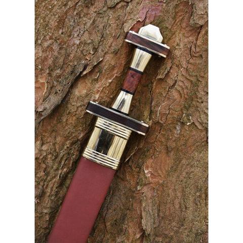 image of a replica germanic spatha: the pommel consists of a semioctagonal counterweight on a pommel mount; the pommel mount is inlaid with a band of some wood of sorts. The grip is tapering towards the centre, where too that same wood is inlaid. The crossguard is small like a gladius's, so barely enough to cover the knuckles, but also inlaid with a band of wood. It's sheathed and only part of the scabbard is visible; the locket (metal top of the scabbard) is shiny as balls. the rest is faux leather (it was cheap enough for me to want to buy - don't judge my dutch stinginess)