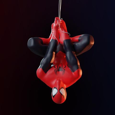 A 3D sculpt of Spider-Man hanging upside-down from a web string.