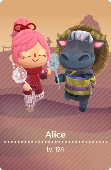 My Camper Card has a brown shaded background. In the foreground, Rodeo the bull and I the pink-haired lady are doing a yoga pose, leaning forward with one leg lifted backwards, and with our eyes closed. We’re wearing a mix of traditional Japanese clothes, and each of us has a handheld fan.
