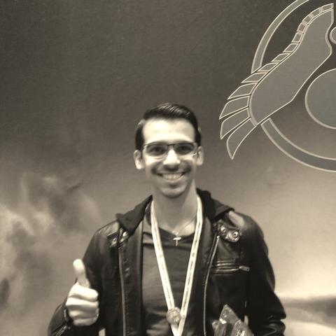 Photo of me giving a thumbs up 10 years ago after winning 2nd place in a Don't Starve tournament at Pax South