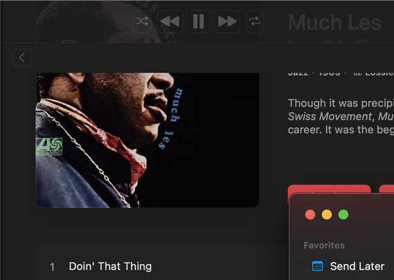 A screenshot of the top left corner of the Mac Music app. An album (Much Les by Les McCann) has been scrolled up past the top of the app. There is a gap between the main Music page and the Music title bar, but in the title bar itself, the page elements are visible, slightly dimmed.