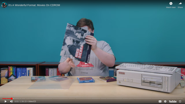 Screenshot of Cathode Ray Dude packing up his High Sierra [1941] laserdisc.