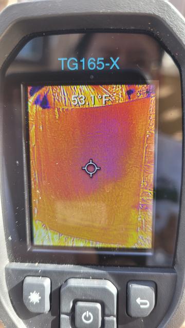 FLIR showing 53.1F surface on main body of towel, folded over in back. Purple on screen.