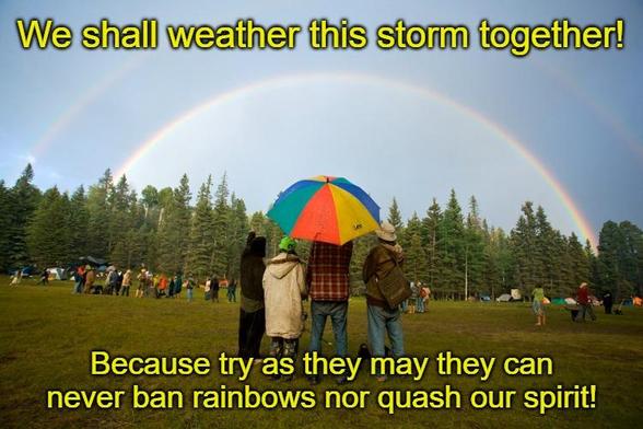 The image shows a group of people standing in a field, facing away from the camera. They are holding a large, colorful umbrella. In the background, there is a rainbow arching across the sky above a line of trees. The text on the image is in bright yellow and reads: "We shall weather this storm together! Because try as they may, they can never ban rainbows nor quash our spirit!"

(Image credit: National Geographic)