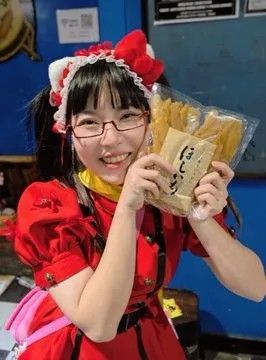 Menma holds up gift noodled