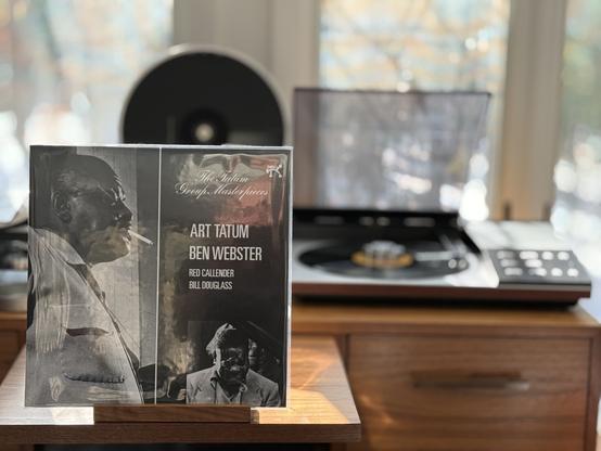 Art Tatum & Ben Webster - The Tatum Group Materpieces LP cover.

Two separate pictures of Art Tatum and Ben Webster on a black background. The black LP plays on a vintage, restored Bang & Olufsen Beogram 8002 linear-tracking turntable to the right.