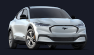 Picture of a Ford Mach-E. Its white. Pic from the front. Cool mustang symbol black front grill.