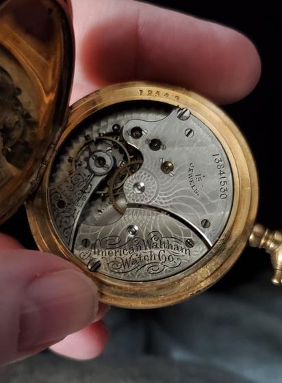 Workings of a Waltham gold-plated pocket watch