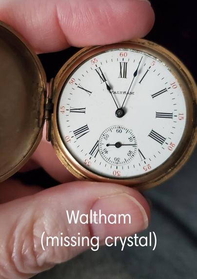 Face of a gold-plated pocket watch