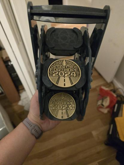 Blue acrylic wheel with 3 visible coin spots, 2 of them filled (the 3 unseen spots empty as well)
The acrylic is a little dusty, may want to work on that...