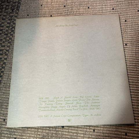 Rear cover. Same as cover. Small piece of text at top stating all songs by Scott Engel. At the bottom, a track list.