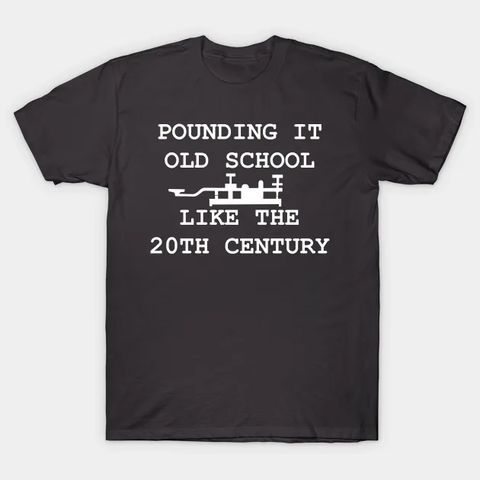 A morse code straight key, in profile, the words above it are
"POUNDING IT
OLD SCHOOL"
...and below the key, it reads...
"LIKE THE
20TH CENTURY"

This is in bold white on a dark gray T-shirt.