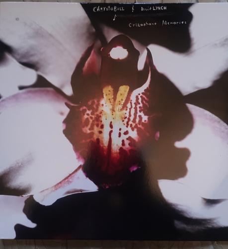 Close up of petals and red centre of a flower on the David Lynch album cover