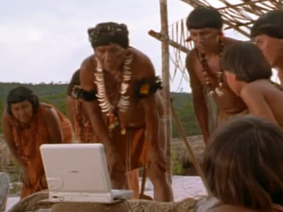 The native people look at Michael's Compaq LTE Elite with interest in "Jungle 2 Jungle".