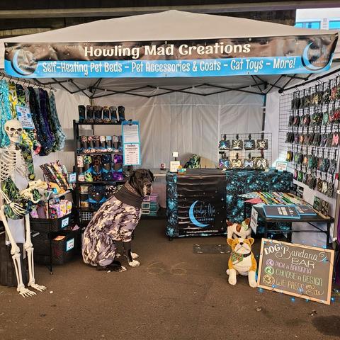 our booth at the Fremont Sundau Market today filled with all handmade pet products! Also modeling is Murdock and black woth white Great Dane wearing his custom snow camo jammies.