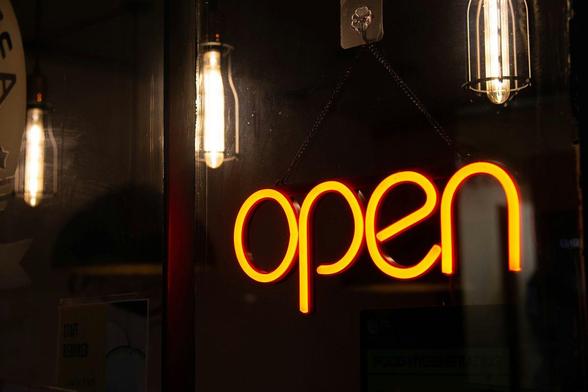 Open is the downright word, under three flickering lights.