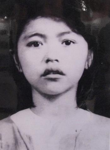 Portrait of Võ Thị Sáu at the Vung Tau Police Office. Age 15. 1949.
Black and white photo.